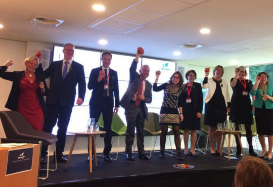 Speakers throw tomatoes at the audience